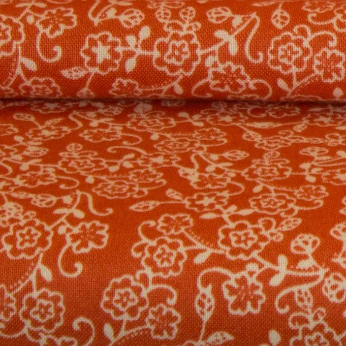 Katoen oranje met bloemenpatroon